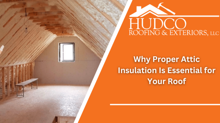 An unfinished attic with exposed wooden beams and a small window at the far end. The right side features the HUDCO Roofing & Exteriors LLC logo and the text "Why Proper Attic Insulation Is Essential for Your Roof" against an orange background.