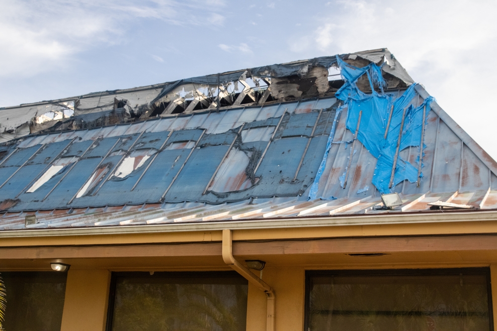 how to get insurance to pay for roof replacement